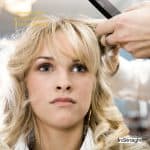 lady having her hair curled at the salon